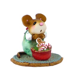 Girl mouse kneeling behind and pot full of Christmas candy