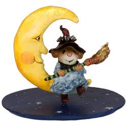 This little witch is hanging out on the moon