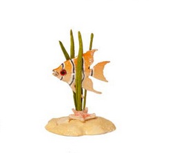Angelfish peeks from behind some reeds deep beneath the sea. 