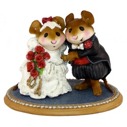 Bride and groom mice pose in formal wedding attire
