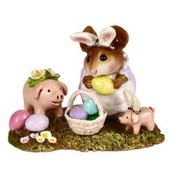 Young female mouse with Easter eggs and toy pigs!