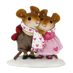 Two mice in the snow sharing a Valentines scarf