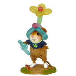 Young mouse with balloon hat and balloon sword