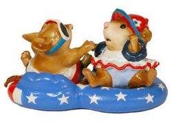 Babies enjoying their floaties decked out in all their Fourth of July best! 
