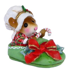 Female mouse in large Christmas slipper