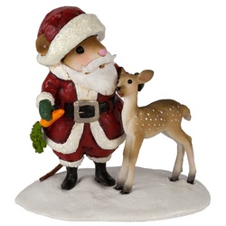 Santa hold carrot treat for a juvenile deer