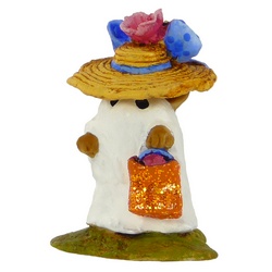 Very young mouse wearing a white sheet with sparkly bag and large flowery hat