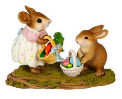 Miss Mouse has an Easter basket full of carrots to exchange with a little bunny bringing colorful Easter eggs 