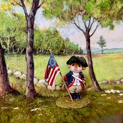 This little mouse  patriot with the flag -  celebrates the 250th anniversaryof the battles of Concord and Lexington. 