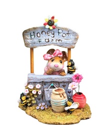 Road side stand selliong Honey