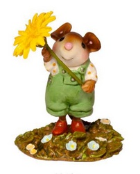 Young make mouse with large dandelion