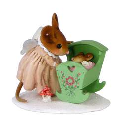 Mouse with angel wings rocking a crib