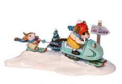 Christmas mouse twoing child snowboarderr with snowmobile
